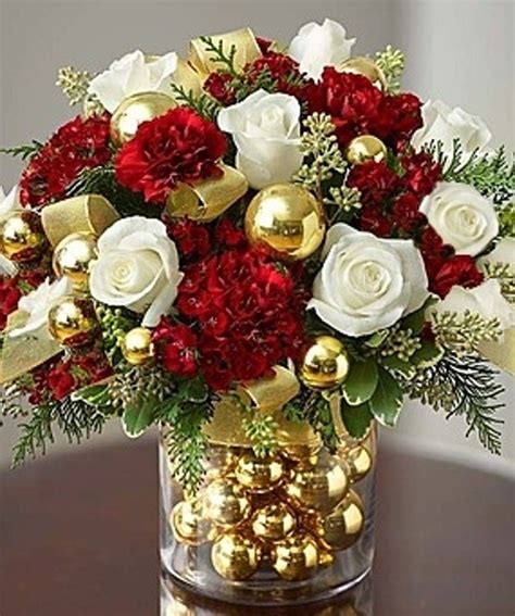 Deck The Halls Christmas Flower Arangement Feauring Roses And Festive