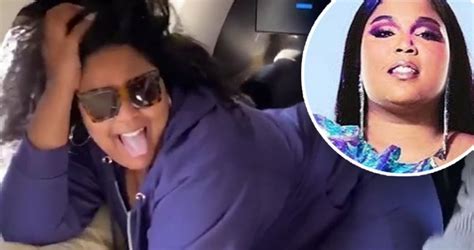 Lizzo Keeps It Casual In A Purple Tracksuit As She Leads A High Flying