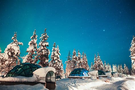 see the northern lights from a glass igloo in the middle of the finnish wilderness business