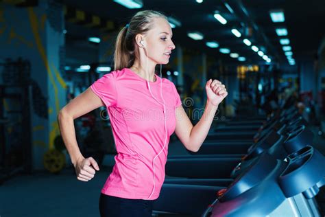Attractive Fitness Girl Running On Machine Treadmill Pretty Girl Doing