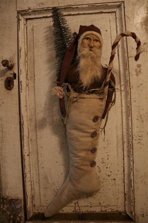 Prim Santastuffed In A Stockingwith A Tree And Cane Primitive Christmas Decorating