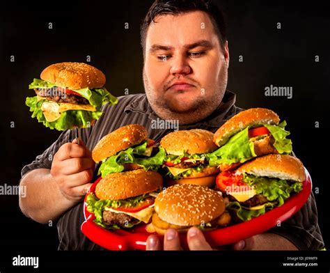 Big Fat Man Eating Burger - pic-wabbit