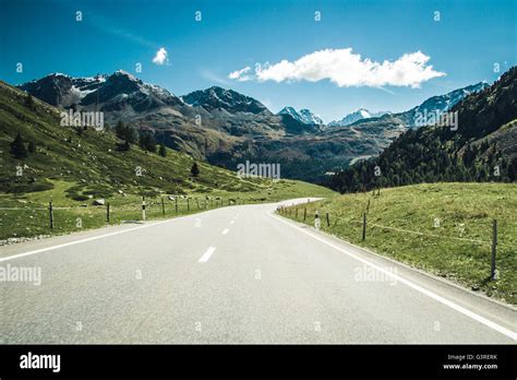 A Road Through Swiss Alps Stock Photo Alamy