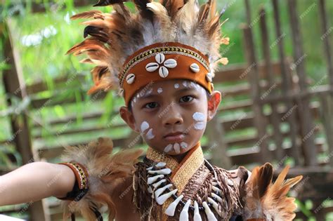 Premium Photo Asian Children Wearing Papua Traditional Clothes And