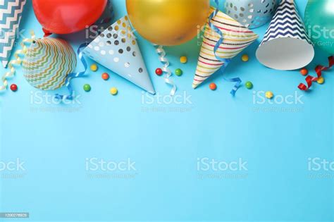 Composition With Different Birthday Accessories On Blue Background
