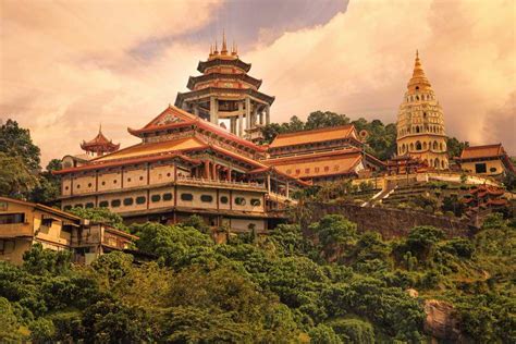 With its golden pagodas glinting in the sun and rows upon rows of buddha statues, the chinese temple is bound to wow fans of religious architecture and design. Buddhist temple Kek Lok Si in Penang