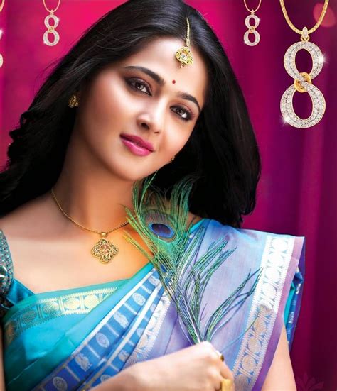Actress Anushka Shetty Stills In Sleeveless Blue Transparent Saree