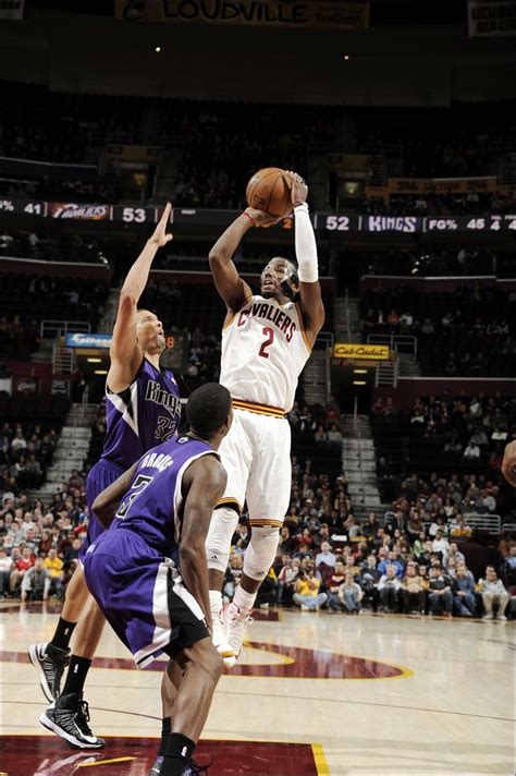 Guard Kyrie Irving Shoots Against The Sacramento Kings At Quicken Loans