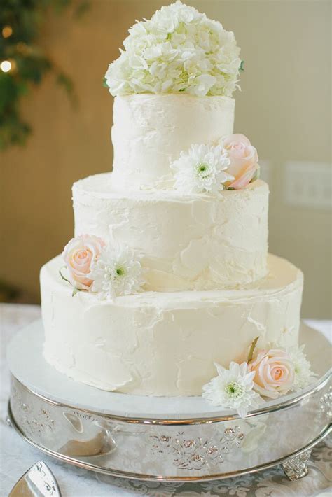 Simple All White Wedding Cake With Fresh Flowers
