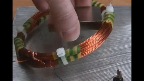 The electromagnet is a simple piece of metal wire wound in a coil. Electromagnetic Induction - How to Make an Electromagnet ...