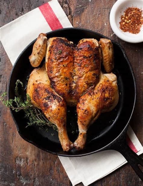 Sprinkle salt and pepper on chicken thighs and place the chicken skin side down into skillet. Roast Butterflied Chicken with Italian Chili Butter ...