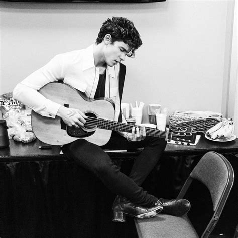 Image May Contain 1 Person Sitting Guitar And Indoor Shawn Mendes