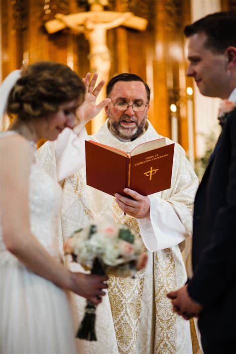 Catholic Wedding Mass Priest Blessing Bride And Groom Wedding Bride