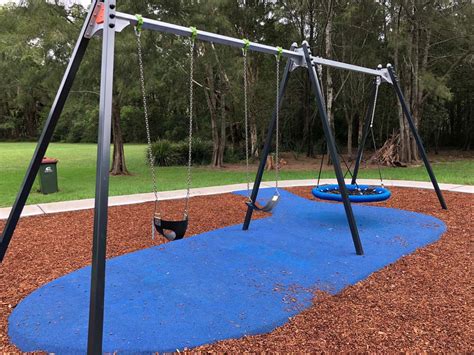 Swings At Cutrock Park Playground Ourimbah Playing In Puddles