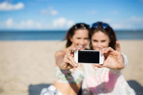 Two Girls On Beach Taking Selfie By Smartphone Stock Image Image Of Holiday Life 89798631