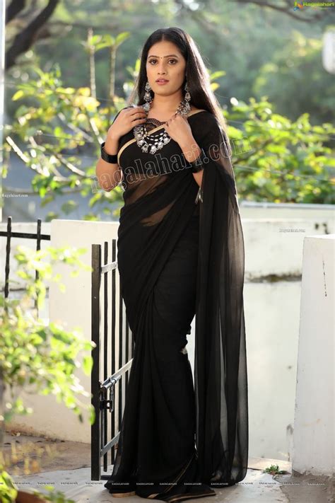 Anusha Parada In Black Saree With Gold Border Exclusive Photo Shoot