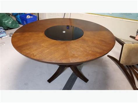 I set up a round over bit in the router table with a guide bearing on the top. Round, solid wood dining room table with glass lazy-susan ...