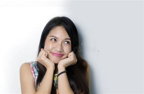 Cute Asian Lady Smile With Pink Lipstick On Studio Shot Stock Photo