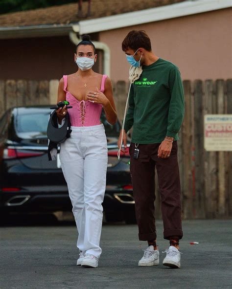 The pair are pictured seemingly caught off guard, with lipa turning around to catch the camera's gaze. DUA LIPA and Anwar Hadid Out for Dinner in Los Angeles 08 ...