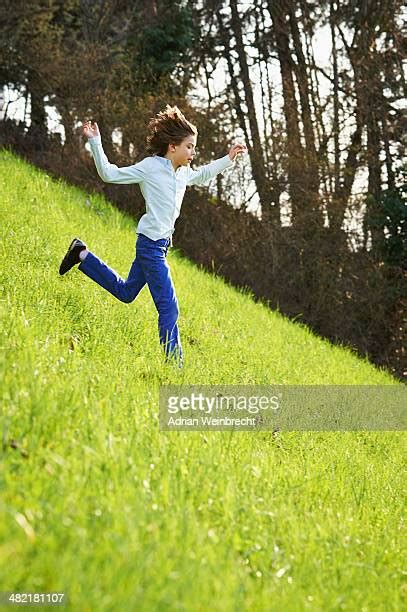 Boy Running Down Hill Photos And Premium High Res Pictures Getty Images