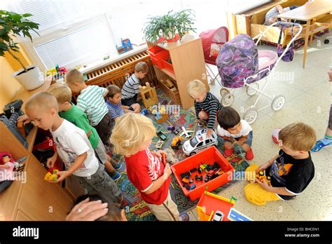 Preschool Children Playing In Class With Toys Stock Photo Alamy