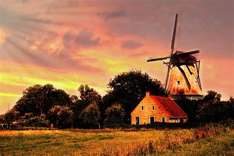 Old Windmill On A Dutch Farm At Sunset Photograph By Debra And Dave