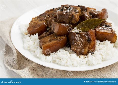Homemade Filipino Adobo Pork With Rice On A White Plate Side View Closeup Stock Image Image