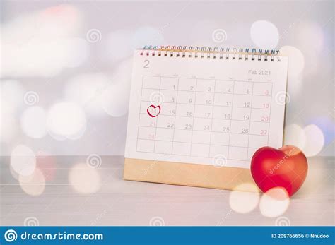 Calendar And Heart Shape With Memo 14 February Valentine Day On Desk