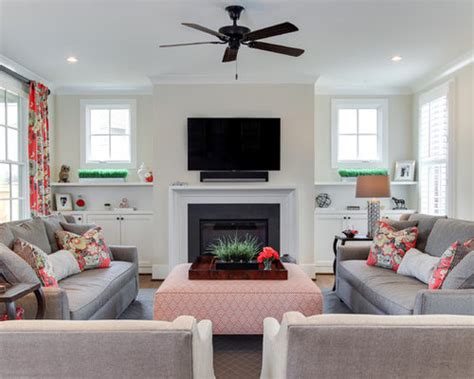 This living room features a sofa with two accent chairs nestled across from it with a coffee table between the three 7. Two Couch | Houzz