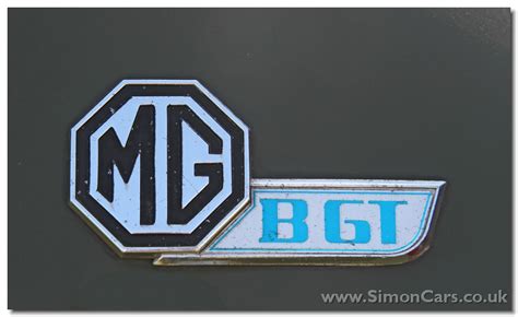 British Made Mgb Mgbgt And Mg Midget Noir And Chrome Front Grill Badge Mg