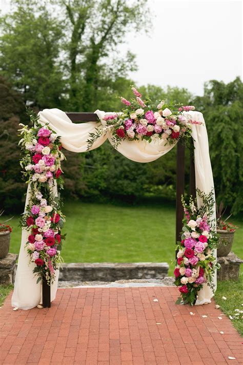 Wedding Arch With Lush Pink Flowers And Draping By Lark Floral At Rosemont Manor In Berryville