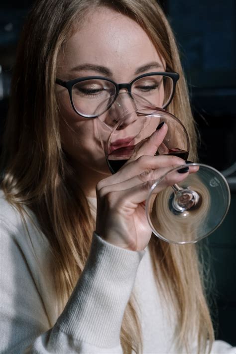 Close Up Photo Of Woman Drinking Wine · Free Stock Photo