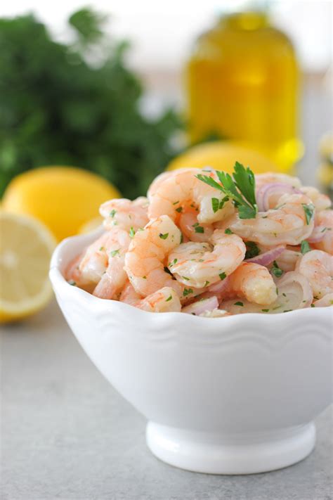 10 tablespoons olive oil, 1 1/2 pounds large uncooked shrimp, peeled, deveined, 3 tablespoons fresh lemon juice, 2 tablespoons dijon mustard, 2 tablespoons chopped fresh dill, 2 large garlic cloves, minced, 1 tablespoon grated lemon peel, 1/4 cup drained capers. Marinated Shrimp Appetizer - Olga's Flavor Factory