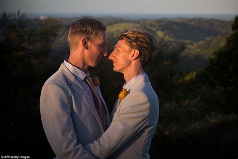 australian same sex couples marry in midnight ceremonies daily mail