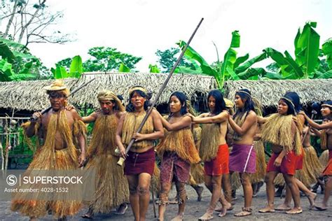 iquitos peru amazon jungle a yagua tribe does a cermonial dance in their village square