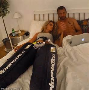 Laura Dundovic Dons Workout Recovery In Bed With Quade