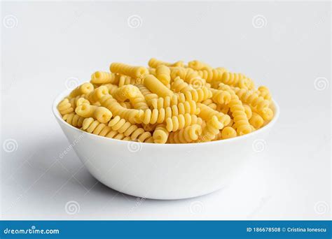 Dried Fusilli Italian Pasta In A Round Bowl Ready To Be Cooked