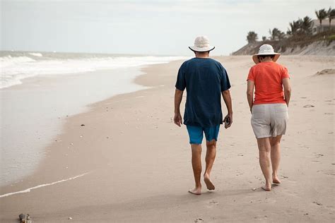 Old Elderly Beach Walk Relax Retirement Senior Couple Vacation