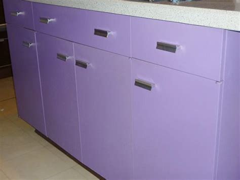 An organized pantry is as pretty as it is functional. Purple and walnut 1970 St. Charles metal kitchen - Retro Renovation