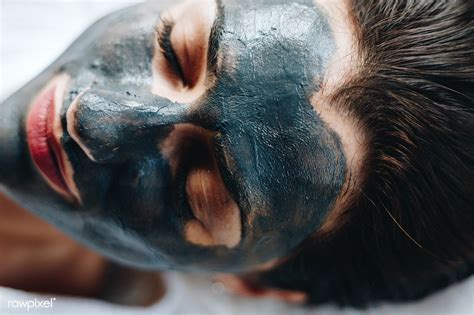 Download Premium Image Of Woman Relaxing With A Facial Mask At The Spa Facial Masks Facial