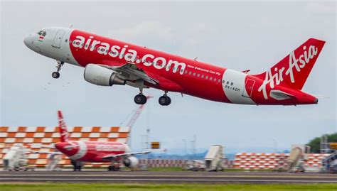 airasia apologises after video goes viral of paraplegic passenger crawling across cabin floor