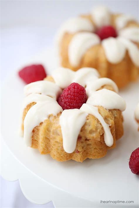 Kinda like an abnormally shaped doughnut? Mini raspberry bundt cakes with cream cheese glaze - I ...