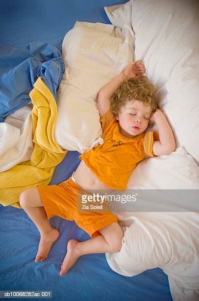 Boy Sleeping Top View Photos And Premium High Res Pictures Getty Images