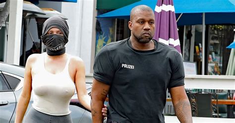Kanye Wests Rocks Huge Shoulder Pads And No Shoes On Trip To Get Ice Cream With Wife Bianca