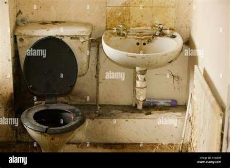 A Disgusting Bathroom In An Abandoned Council House In Carlisle Cumbria Uk Stock Photo Alamy
