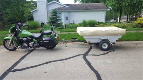 Motorcycle carrying trailers may be open or enclosed. Motorcycle camper Trailer Pull behind your bike Pop up ...