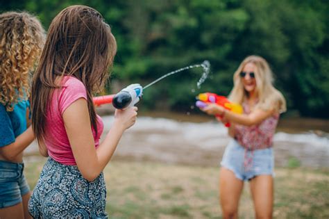Water Gun Fight Stock Photo Download Image Now 20 29 Years Adult
