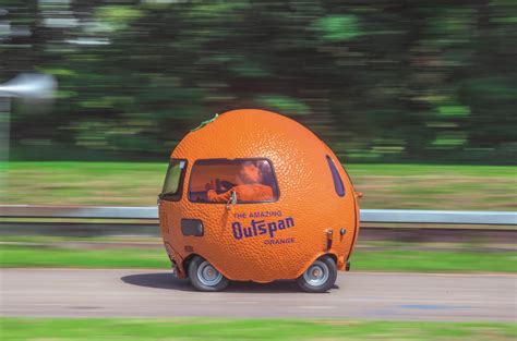 Strange Fruit Driving The Mini Based Outspan Orange Autocar