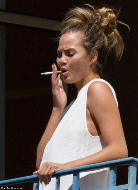 braless chrissy teigen enjoys a cigarette before mailonline party at cannes lions daily mail