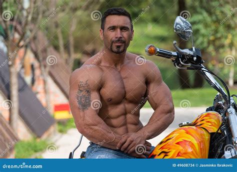 Muscular Man And Motorcycle Stock Photo Image Of Adventure